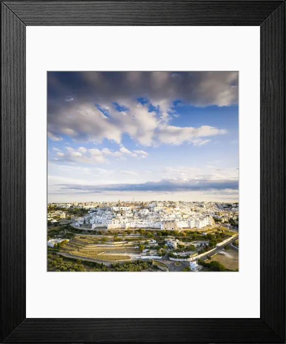 Framed Print : Aerial panoramic of the white town of Ostuni at sunset, province of Brindisi, Salento Framed Print : Aerial panoramic of the white town of Ostuni at sunset, province of Brindisi, Salento