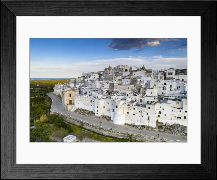 Framed Print : Whitewashed houses of Ostuni old town, aerial view, province of Brindisi, Salento, Apulia Framed Print : Whitewashed houses of Ostuni old town, aerial view, province of Brindisi, Salento, Apulia