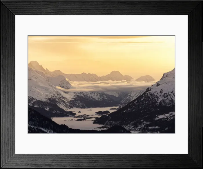 Framed Print : Alpine lakes of Engadine and village of Maloja covered with snow at sunset Framed Print : Alpine lakes of Engadine and village of Maloja covered with snow at sunset