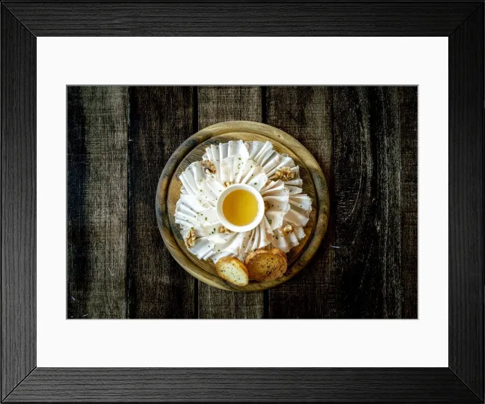Framed Print : Chopping board with lard meat, walnuts and honey appetizer on wood table background Framed Print : Chopping board with lard meat, walnuts and honey appetizer on wood table background