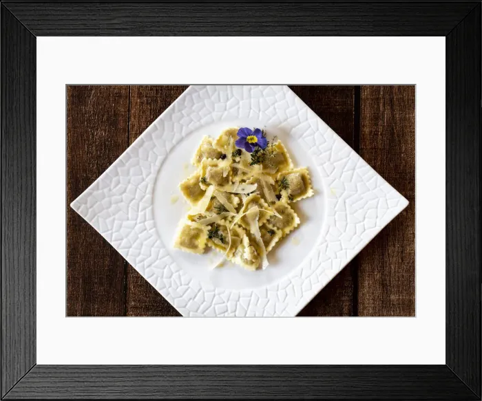 Framed Print : Ravioli traditional pasta stuffed with game meat in white dish from above Framed Print : Ravioli traditional pasta stuffed with game meat in white dish from above