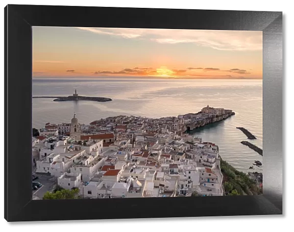 White buildings by the sea at dawn, aerial view, Vieste, Foggia province