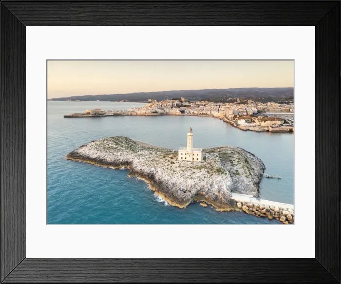 Framed Print : Aerial view of Vieste lighthouse on Sant Eufemia islet by the sea, Foggia province Framed Print : Aerial view of Vieste lighthouse on Sant Eufemia islet by the sea, Foggia province