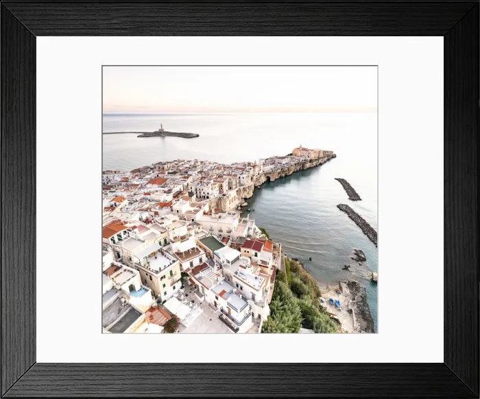 Framed Print : Whitewashed houses in the old town of Vieste at sunrise, aerial view, Foggia province Framed Print : Whitewashed houses in the old town of Vieste at sunrise, aerial view, Foggia province