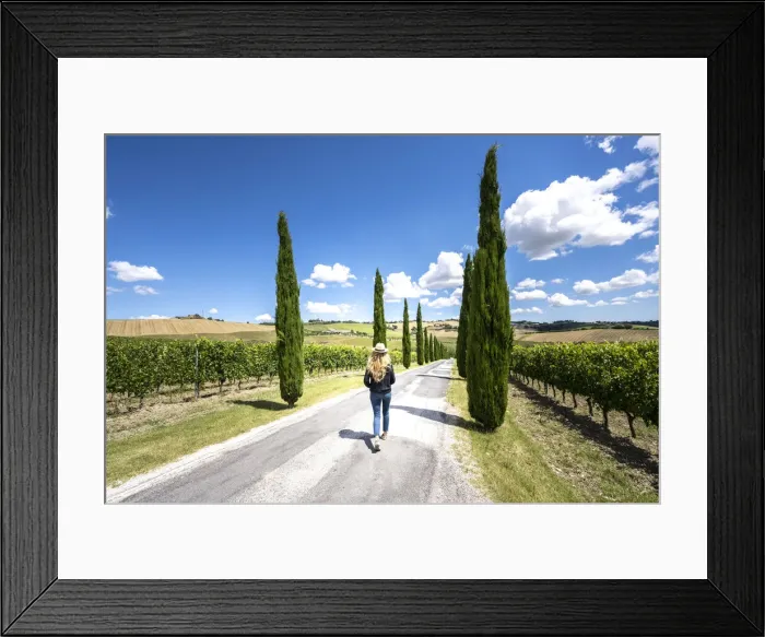 Framed Print : A girl walking under the sun into wineyards landscape near Macerata, Marche region, Italy Framed Print : A girl walking under the sun into wineyards landscape near Macerata, Marche region, Italy