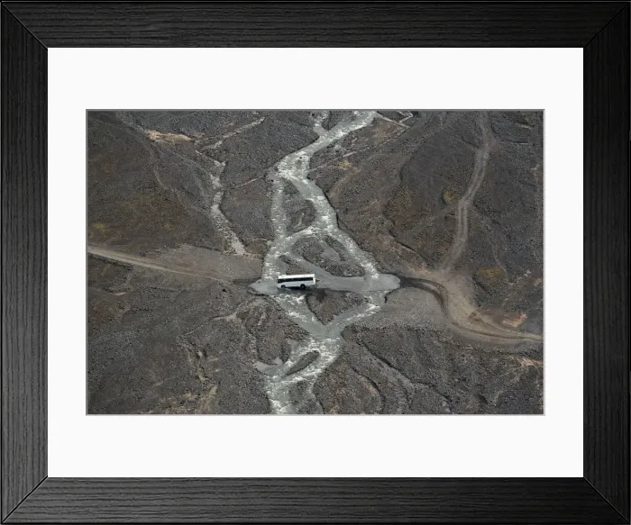 Framed Print : A bus crossing a river at Porsmork, Icelandic highlands, Iceland Framed Print : A bus crossing a river at Porsmork, Icelandic highlands, Iceland