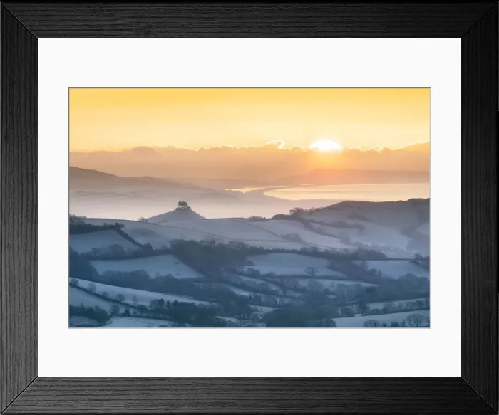 Framed Print : Frosty winter sunrise from Lamberts Castle looking across the Marshwood Vale towards