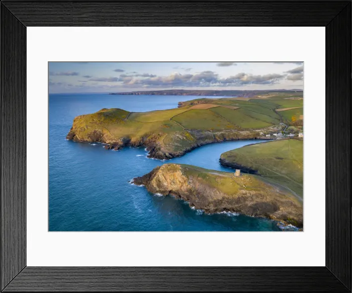 Framed Print : Aerial vista of Doyden Castle on the headland at Port Quin, Cornwall, England Framed Print : Aerial vista of Doyden Castle on the headland at Port Quin, Cornwall, England