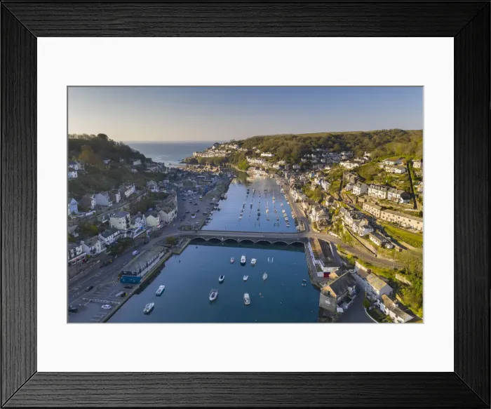 Framed Print : Aerial view of the beautiful Cornish fishing town of Looe on a sunny spring morning, Looe Framed Print : Aerial view of the beautiful Cornish fishing town of Looe on a sunny spring morning, Looe