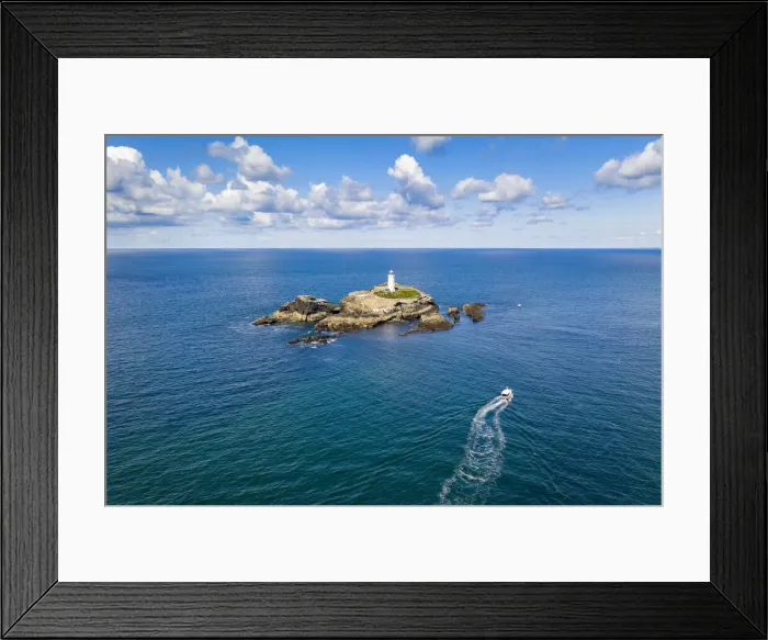 Framed Print : Aerial view of boat approaching Godrevy lighthouse and island, St Ives Bay, Cornwall Framed Print : Aerial view of boat approaching Godrevy lighthouse and island, St Ives Bay, Cornwall