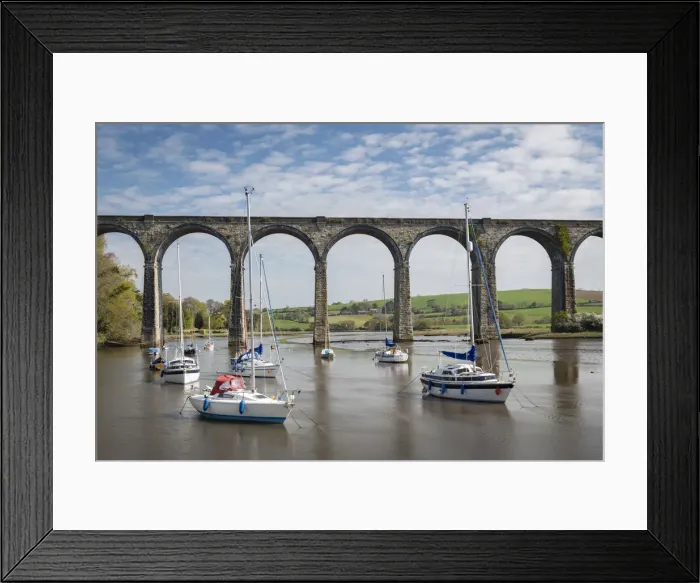 Framed Print : Boats moored on the River Tiddy beneath the St Germans viaduct, St Germans, Cornwall Framed Print : Boats moored on the River Tiddy beneath the St Germans viaduct, St Germans, Cornwall