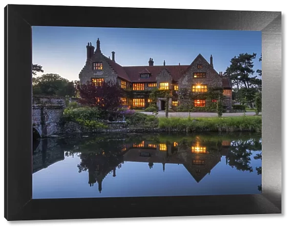 Hindringham Hall Reflecting in Moat at Twilight, Norfolk, England