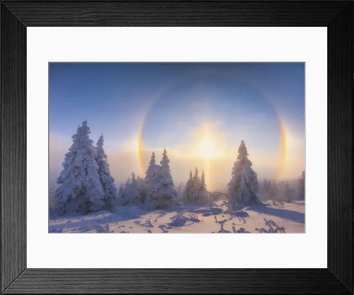 Framed Print : Solar halo in deep snow-covered winter landscape at Fichtelberg at sunset Framed Print : Solar halo in deep snow-covered winter landscape at Fichtelberg at sunset