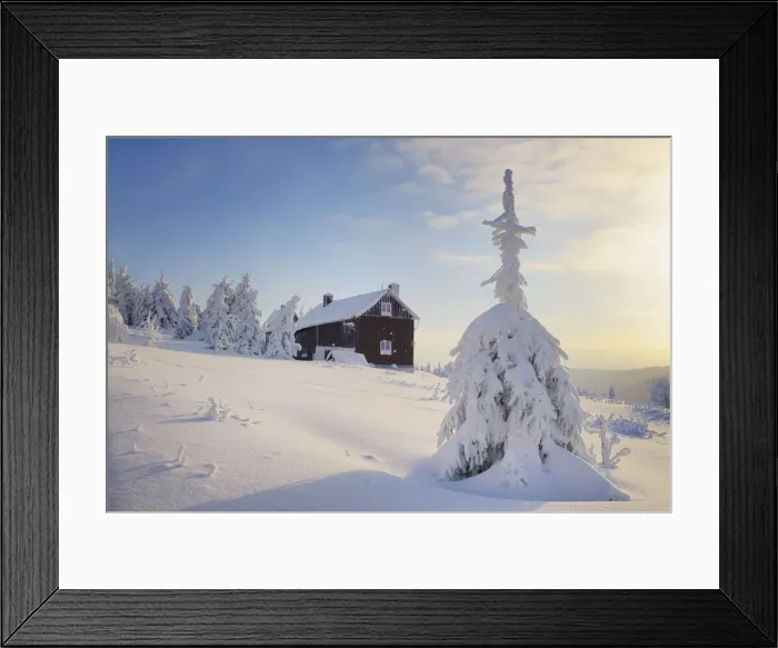 Framed Print : mountain cottage in deep snow-covered winter landscape at Fichtelberg at sunset Framed Print : mountain cottage in deep snow-covered winter landscape at Fichtelberg at sunset