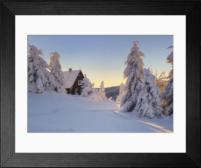 Framed Print : mountain cottage in deep snow-covered winter landscape at Fichtelberg at sunset Framed Print : mountain cottage in deep snow-covered winter landscape at Fichtelberg at sunset