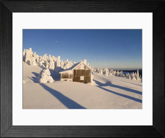 Framed Print : Mountain cottage in deep snow-covered winter landscape at Fichtelberg at sunset Framed Print : Mountain cottage in deep snow-covered winter landscape at Fichtelberg at sunset