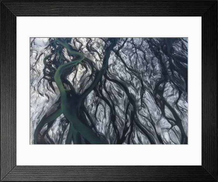 Framed Print : Aerial view of a river delta after a winter snowstorm in the southern part of Iceland. Thorsa river, Iceland