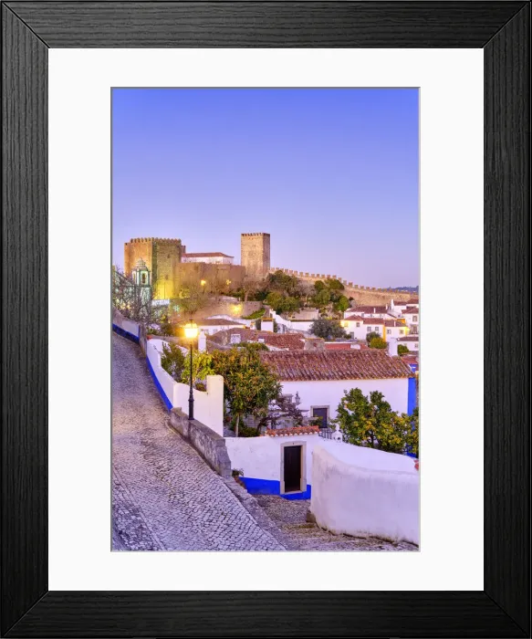 Framed Print : Obidos and the castle at dusk. A traditional medieval village taken to the moors in Framed Print : Obidos and the castle at dusk. A traditional medieval village taken to the moors in