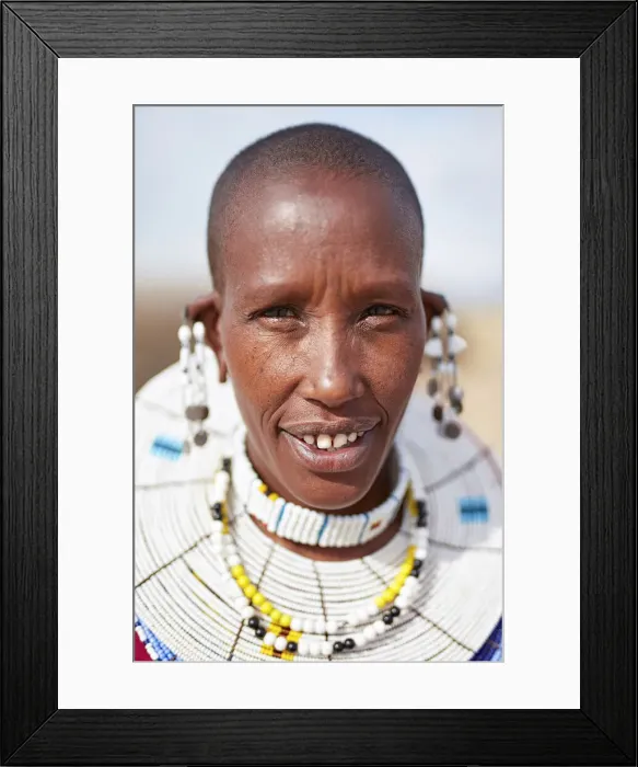 Framed Print : Portrait of a Msai woman wearing traditional beaded jewelry in a village near Arusha Framed Print : Portrait of a Msai woman wearing traditional beaded jewelry in a village near Arusha