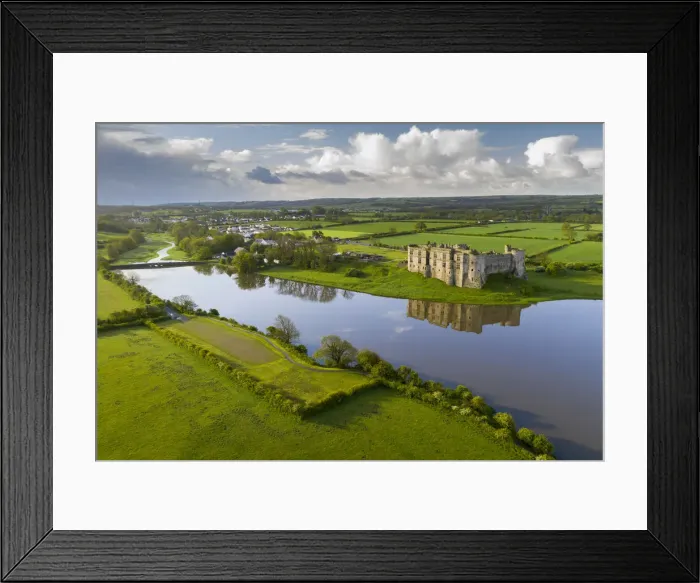Framed Print : Aerial vista of Carew Castle in Pembrokeshire Coast National Park, Wales, UK Framed Print : Aerial vista of Carew Castle in Pembrokeshire Coast National Park, Wales, UK