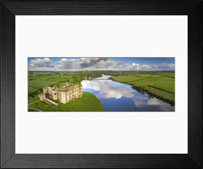 Framed Print : Aerial vista of Carew Castle in Pembrokeshire Coast National Park, Wales, UK Framed Print : Aerial vista of Carew Castle in Pembrokeshire Coast National Park, Wales, UK