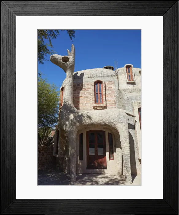 Framed Print : A guanaco sculpture at the entrance of a house in downtown Cafayate, Calchaquai Valleys