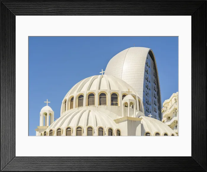 Framed Print : Saint Georgios Church or Ayios Georgios church and The Oval building in Limassol, Cyprus Framed Print : Saint Georgios Church or Ayios Georgios church and The Oval building in Limassol, Cyprus
