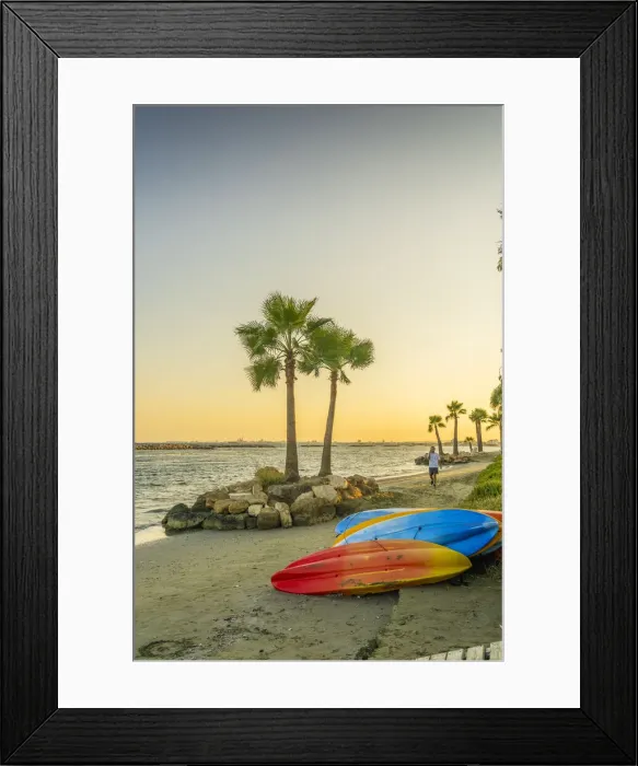 Framed Print : A man walking along Palm Beach in Larnaca, Cyprus Framed Print : A man walking along Palm Beach in Larnaca, Cyprus