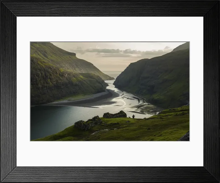 Framed Print : A farmer and his dog walking along the lagoon in Saksun. Streymoy, Faroe Islands Framed Print : A farmer and his dog walking along the lagoon in Saksun. Streymoy, Faroe Islands