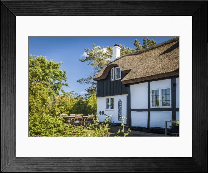 Framed Print : Idyllic half-timbered house in Listed on Bornholm, Denmark Framed Print : Idyllic half-timbered house in Listed on Bornholm, Denmark