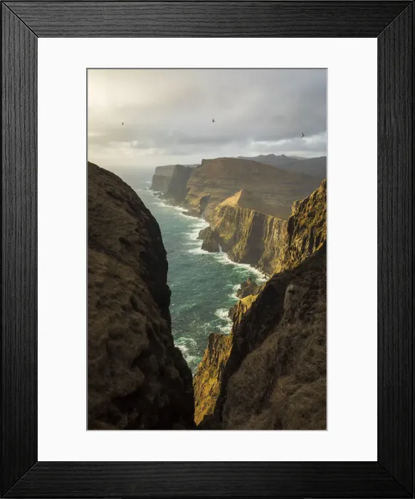 Framed Print : The impressive cliffs on the west coast of Suðuroy seen from Beinisvorð. Suðuroy, Faroe Islands