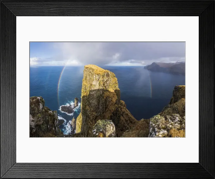 Framed Print : A whole rainbow above Risin og Kellingin sea stacks and Eiðiskollur, a 343 meter high cliff near the village of Eiði. Eysturoy, Faroe Islands Framed Print : A whole rainbow above Risin og Kellingin sea stacks and Eiðiskollur, a 343 meter high cliff near the village of Eiði. Eysturoy, Faroe Islands