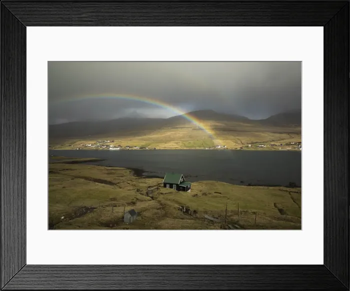 Framed Print : A rainbow above a solitary house in Nesvik. Streymoy, Faroe Islands Framed Print : A rainbow above a solitary house in Nesvik. Streymoy, Faroe Islands