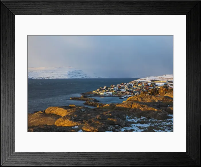 Framed Print : The village of Nolsoy covered by snow. Nolsoy, Faroe Islands