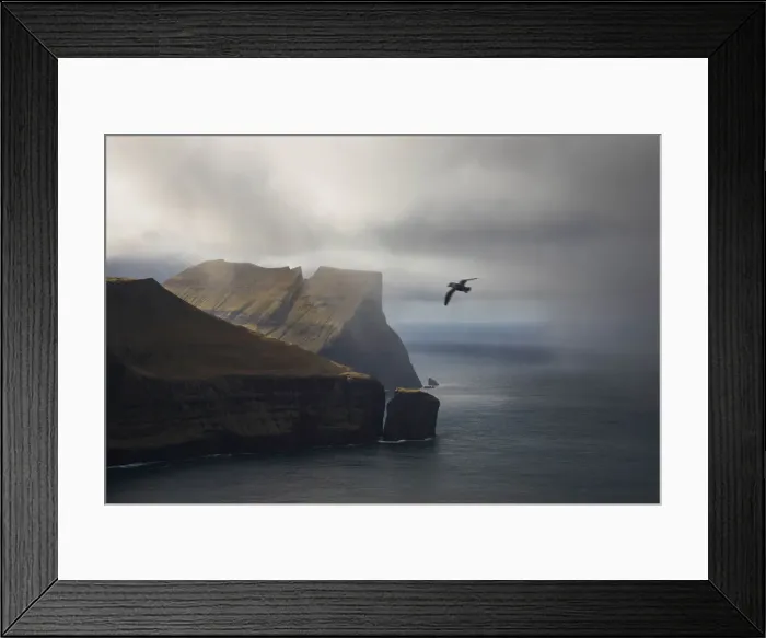 Framed Print : Stakkurin sea stack and the northern side of the island of Streymoy. Faroe Islands Framed Print : Stakkurin sea stack and the northern side of the island of Streymoy. Faroe Islands