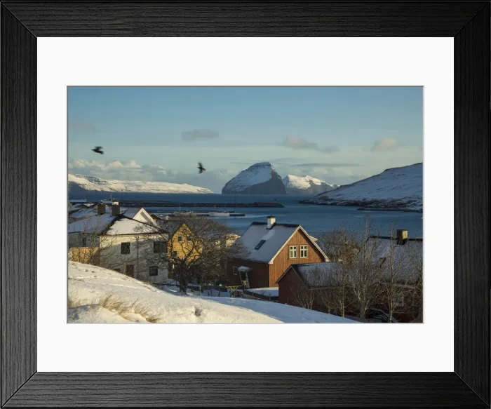 Framed Print : The village of Miðvagur covered by snow. The island of Koltur in the background. Vagar, Faroe Islands Framed Print : The village of Miðvagur covered by snow. The island of Koltur in the background. Vagar, Faroe Islands