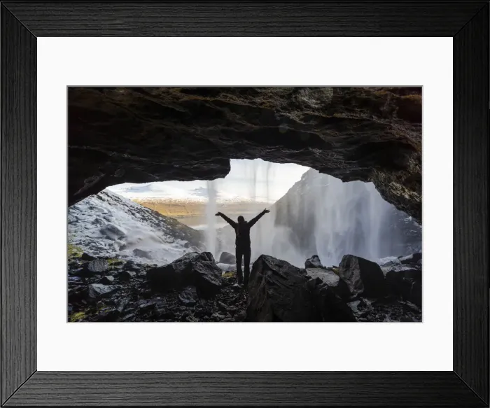 Framed Print : A girl standing behind Fossa waterfall. Streymoy island, Faroe Islands Framed Print : A girl standing behind Fossa waterfall. Streymoy island, Faroe Islands