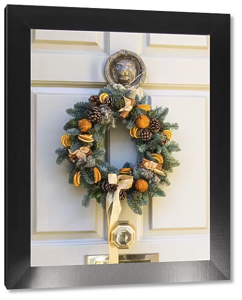 A Christmas wreath on the front door of a house in Bath, Somerset, England