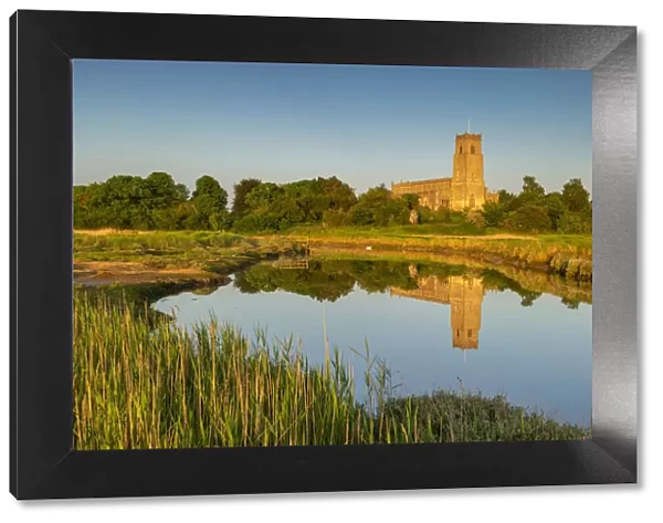 Holy Trinity Church Reflecting in River Blyth, Blythburgh, Suffolk, England