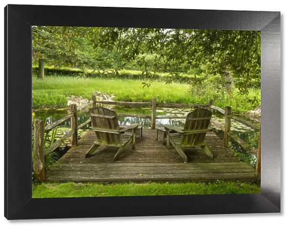 Wooden Deck Chairs Overlooking Pond, Wyken Hall, Stanton, Suffolk, England