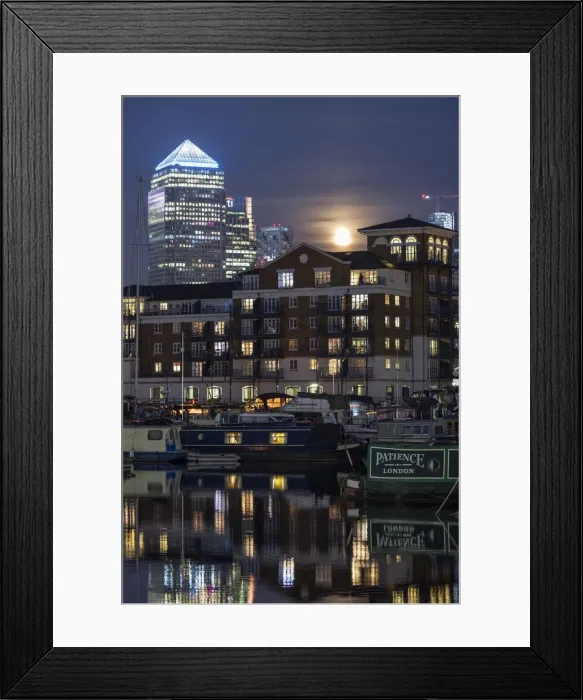 Framed Print : Moon rising behind Canary Wharf, London, England, UK Framed Print : Moon rising behind Canary Wharf, London, England, UK