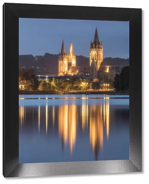 Truro Cathedral reflected in Truro River at dusk, Truro, Cornwall, England, UK