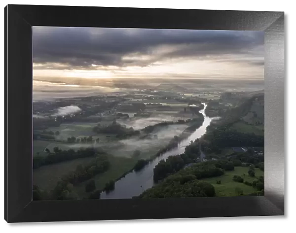 France, Occitanie, Lot, aerial view of the Dordogne river on a misty morning at sunrise