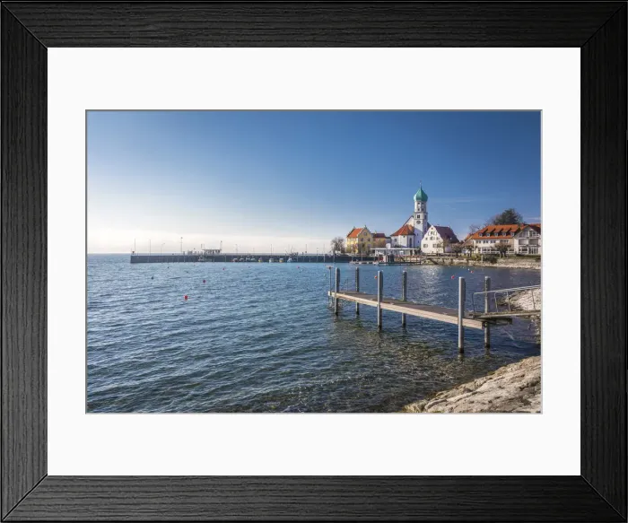 Framed Print : Bank promenade with St. Georg Church, Wasserburg am Bodensee, Bavaria, Germany
