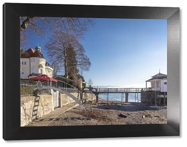 Waterfront promenade with bathing huts in Wasserburg am Bodensee, Bavaria, Germany