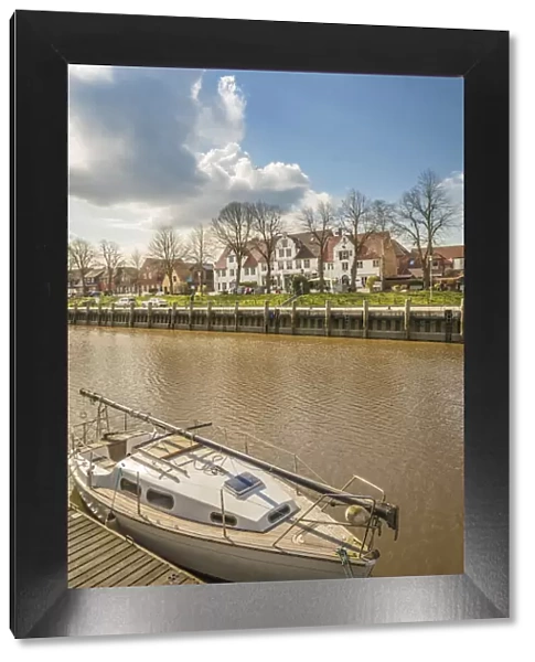 Historic houses at the port of Tonning, North Friesland, Schleswig-Holstein, Germany