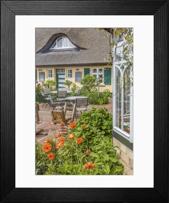 Framed Print : Cafe in an old thatched roof courtyard in Zingst, Mecklenburg-Western Pomerania Framed Print : Cafe in an old thatched roof courtyard in Zingst, Mecklenburg-Western Pomerania