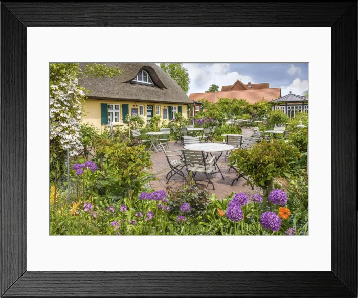 Framed Print : Cafe in an old thatched roof courtyard in Zingst, Mecklenburg-Western Pomerania Framed Print : Cafe in an old thatched roof courtyard in Zingst, Mecklenburg-Western Pomerania