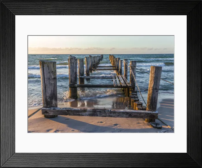Framed Print : Weathered wooden jetty on the beach in Zingst, Mecklenburg-Western Pomerania Framed Print : Weathered wooden jetty on the beach in Zingst, Mecklenburg-Western Pomerania