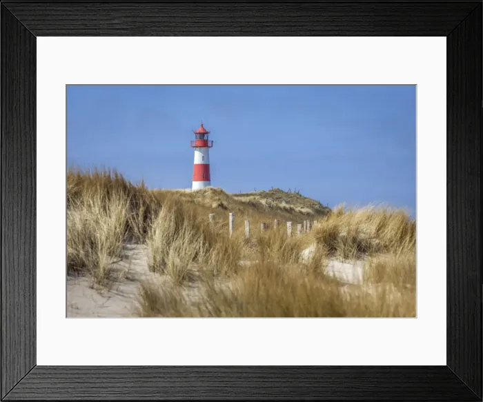 Framed Print : Dune landscape with List-Ost lighthouse on the Ellenbogen Peninsula, Sylt Framed Print : Dune landscape with List-Ost lighthouse on the Ellenbogen Peninsula, Sylt